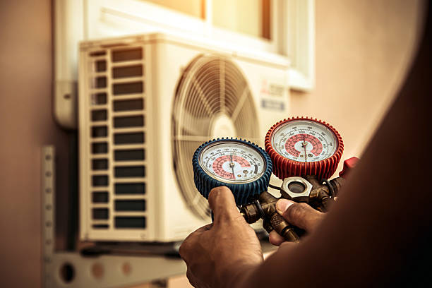 Professional Hvac Maintenance technician working in Inglis, FL